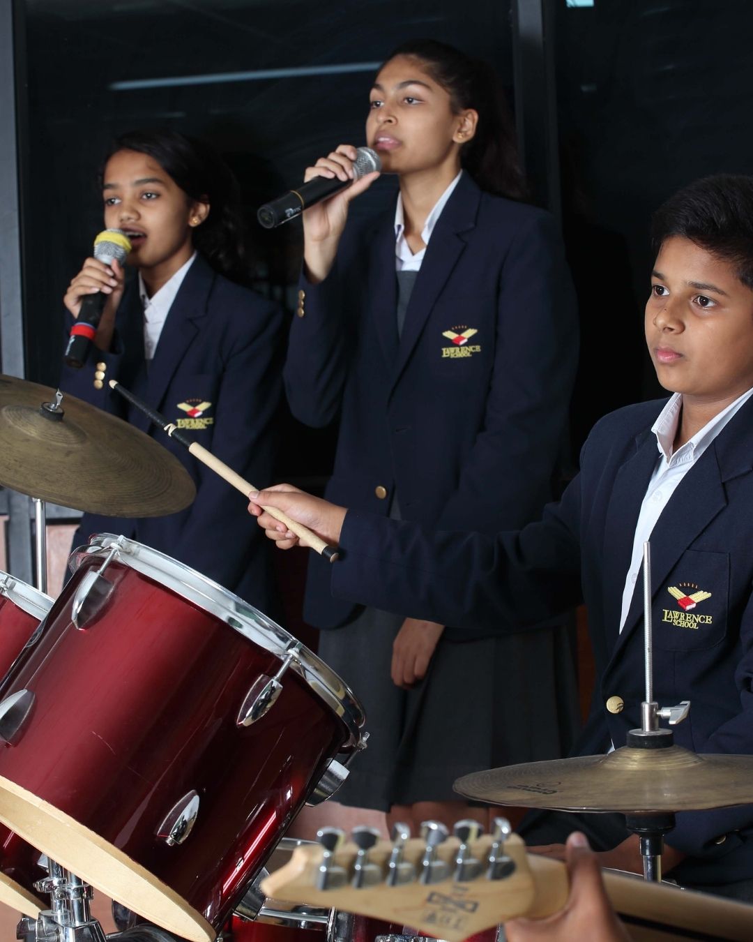 Students playing cricket